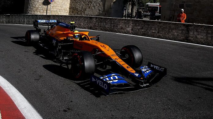 Lando Norris, McLaren MCL35M, enters a corner